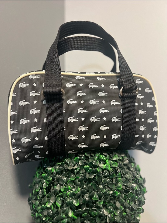 Lacoste Other - Not for sale Lacoste Black Toiletry Barrel Bag with White Logo Print